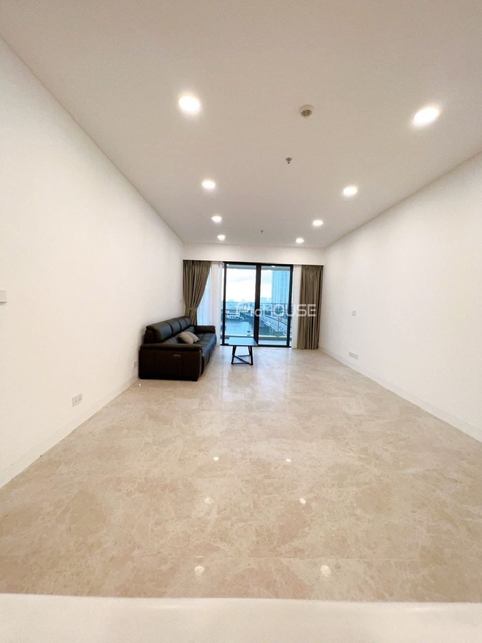 Large 4-bedroom apartment for rent in The River Thu Thiem with basic furniture