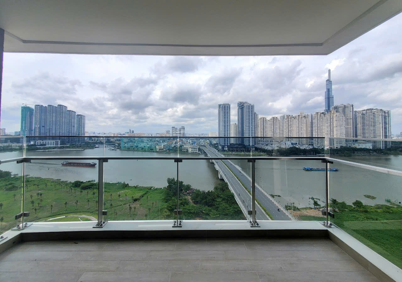 Elegant 4 bedroom apartment offering expansive river views and sophisticated basic furnishings for rent at The River Thu Thiem